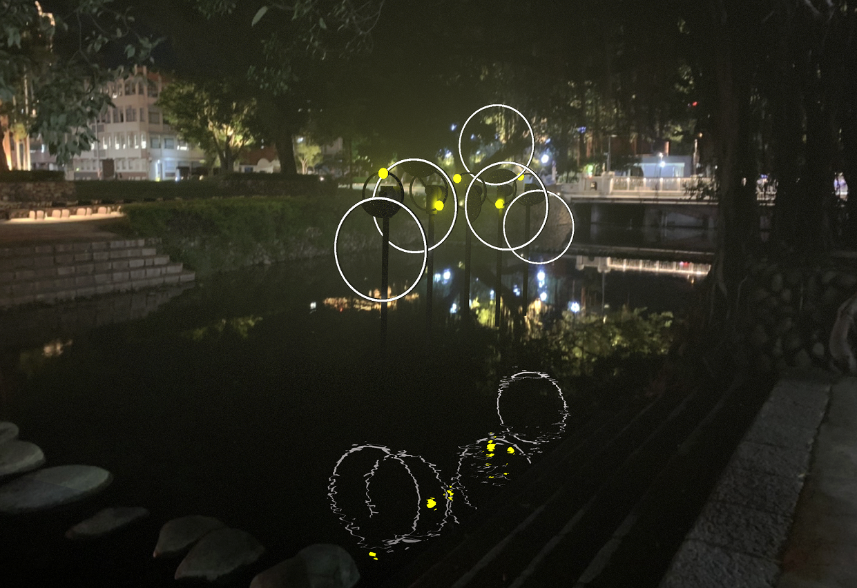 由兩個圓環組成的動力燈光雕塑作品《徹夜未眠直至晨光》。(都市藝術工作室提供)