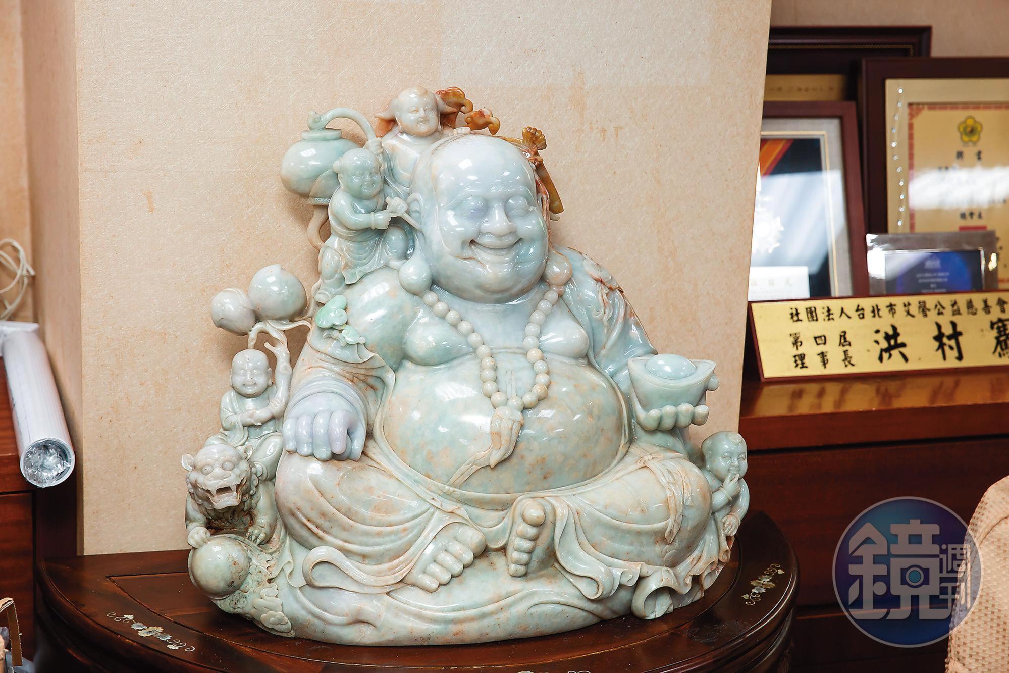 洪村騫收藏許多彌勒佛像。