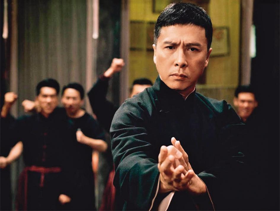 余晉（上圖）濃眉大眼配上一頭短齊劉海，和武打巨星甄子丹有幾分神似。