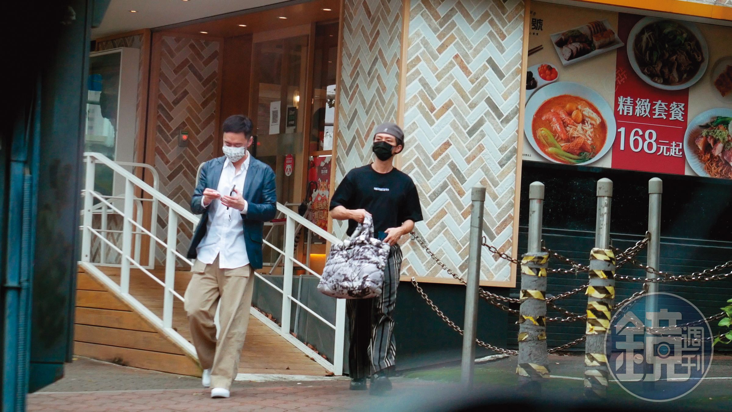 2/16 14:15  用完餐後，兩人分道揚鑣，張承中（左）回辦公室，炎亞綸則駕車返回內湖。