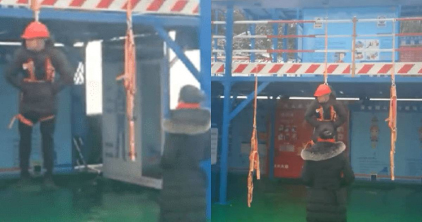 男性工人工作時未妥善繫好安全帶，遭妻子吊掛訓斥。（翻攝自「西部決策」微博）