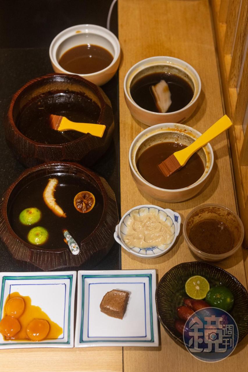 五味澤和實特調數十碟祕製調味料,用來搭配握壽司,創造個人風味。