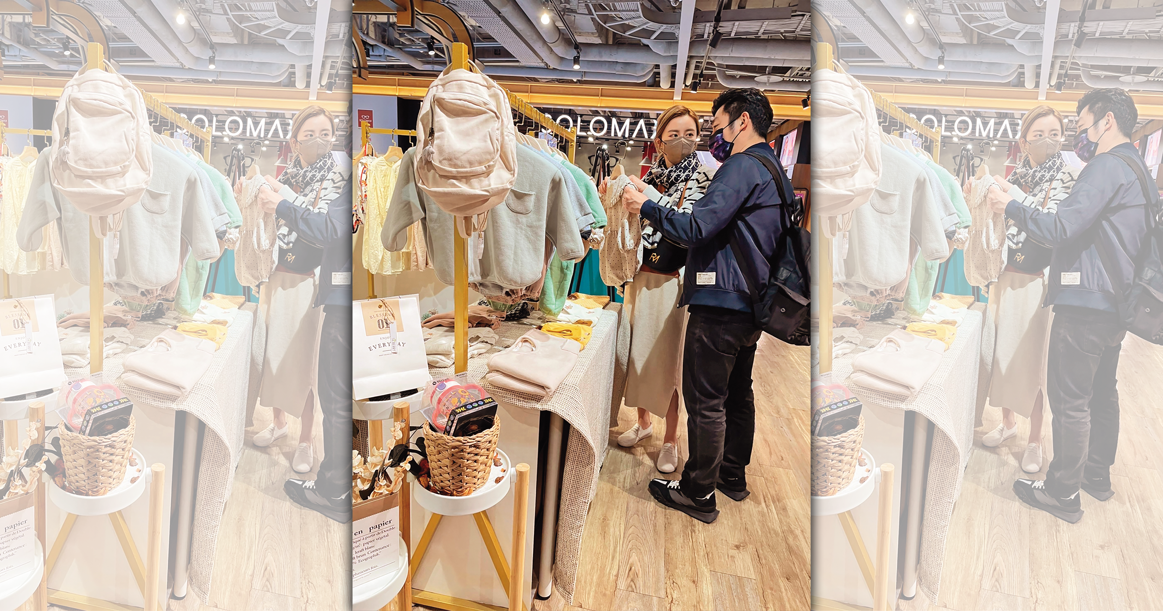 王瞳(左)和艾成(右)現身台北市信義區百貨商場,在嬰兒服飾櫃位挑寶寶衣服。(讀者提供)