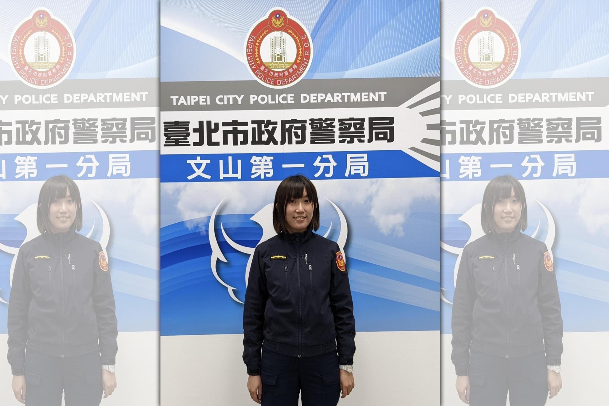 女警呂旻曄守護木柵交通天使。（翻攝畫面）