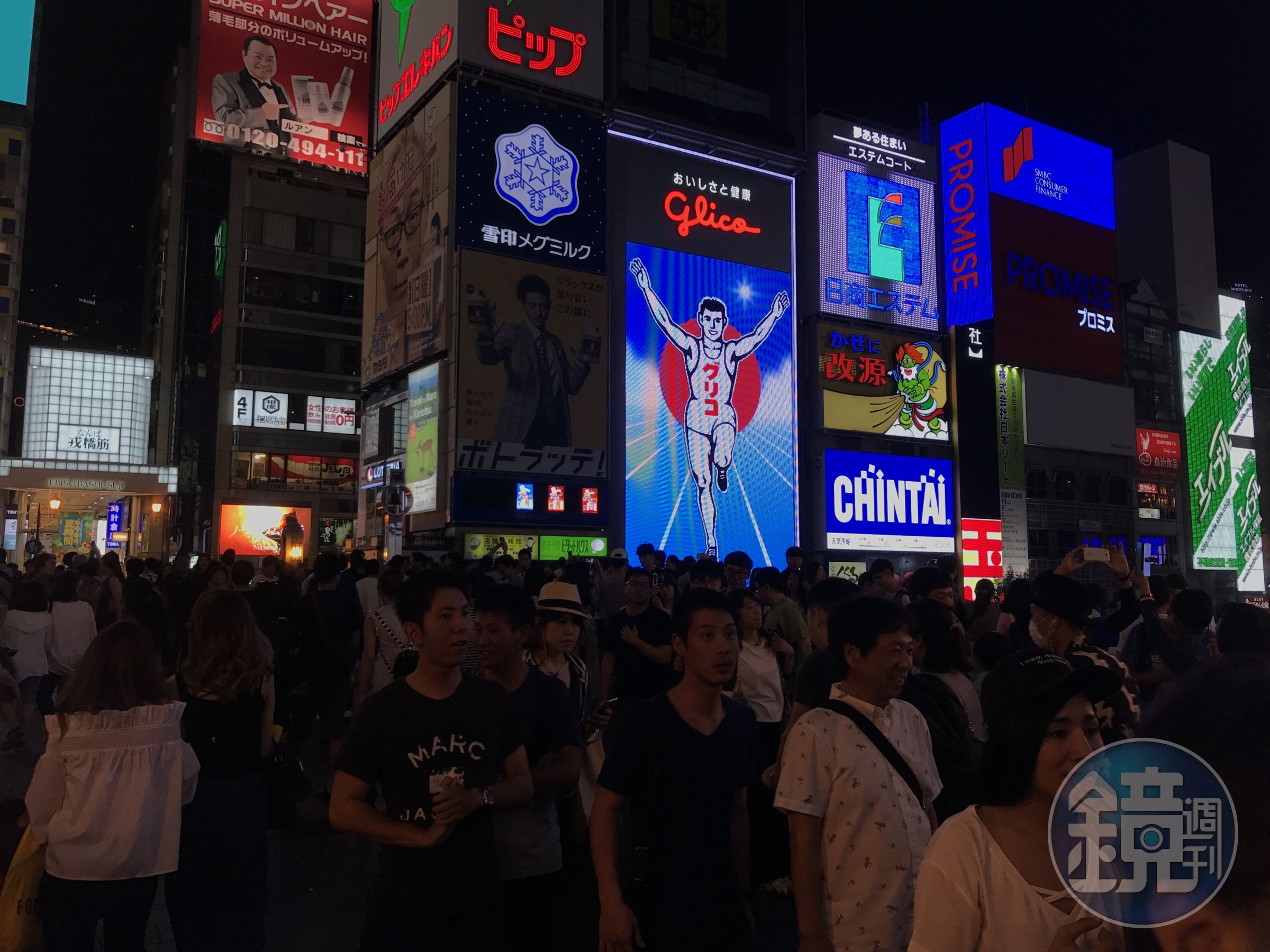 大阪道頓堀著名地標「固力果跑跑人」。（本刊資料照）