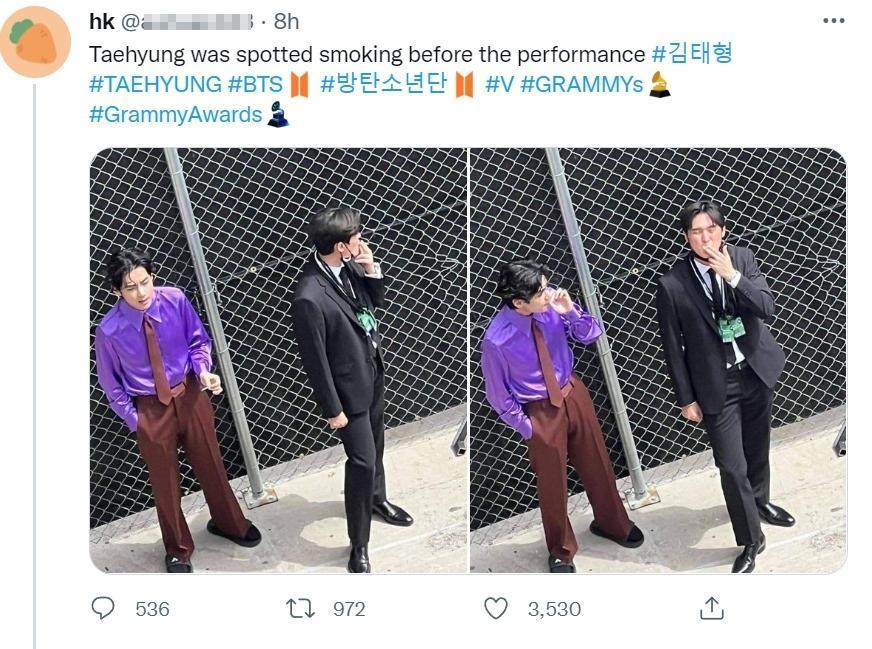BTS成員V金泰亨被拍到和一名黑色西裝男子在葛萊美獎抽菸。(翻攝自推特)