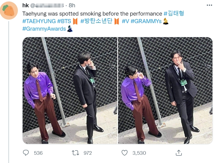 BTS成員V金泰亨被拍到和一名黑色西裝男子在葛萊美獎抽菸。（翻攝自推特）