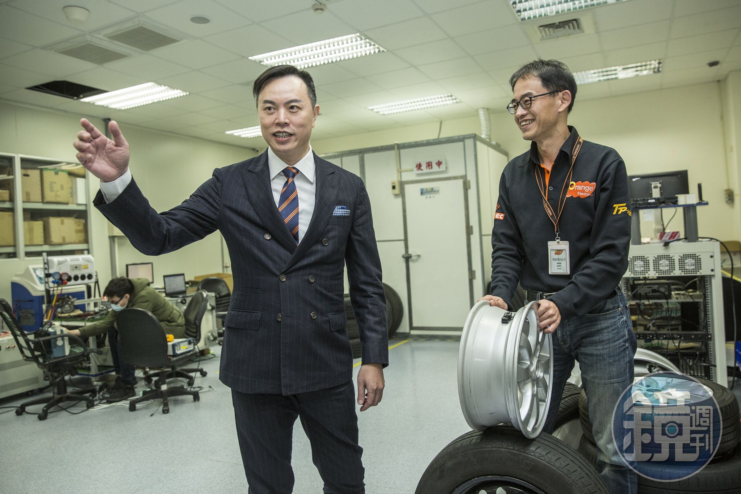 許欽堯（左）每天上健身房重訓，他的合夥人、橙的電子副總游鴻志（右）則是馬拉松好手。