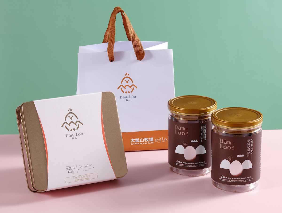 蛋入Dán-Lōo蛋蛋嘉年華手工餅乾禮盒首批限量500盒，預購即加贈「蛋入Dán-Lōo法式可可蛋捲」。（大武山牧場提供）