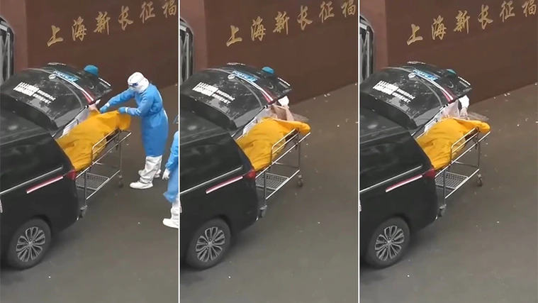 上海一家福利院竟將活著長者要送往殯儀館火化，被阻止竟試圖要硬送。（翻攝自微博）