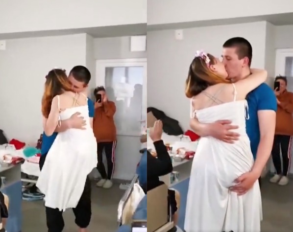 巴蘭迪納(白衣女子)遭地雷炸斷雙腿,男友維克多不離不棄,在醫院向她求婚。(翻攝美國之音推特)