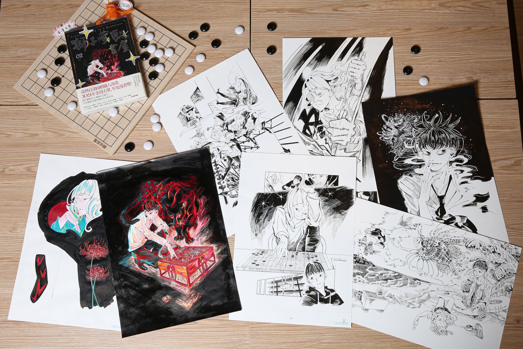 《獅子藏匿的書屋》作者小島認為漫畫家需要更多自我要求。圖為日前在臺灣漫畫基地展出的小島原畫。