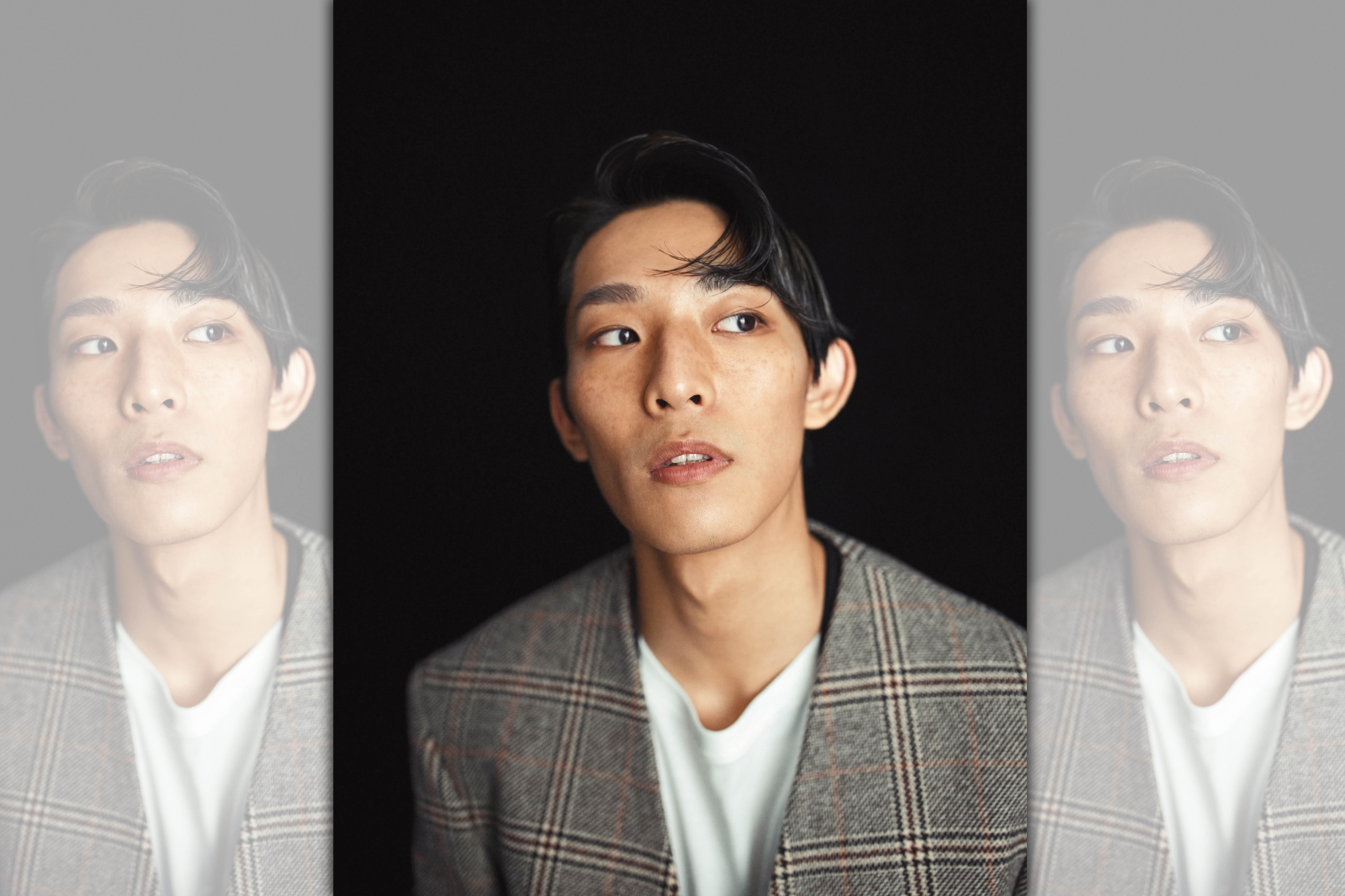 灰色格紋西裝外套NT$73,000、白色T-shirt NT$16,500、黑色西裝背心NT$40,500 by GUCCI；咖啡色機能布料短褲NT$51,000、民族風短襪（價格店洽）、Dean米白色磨紗革拼接酒紅色科技網眼布登山靴NT$42,000 by Dior。