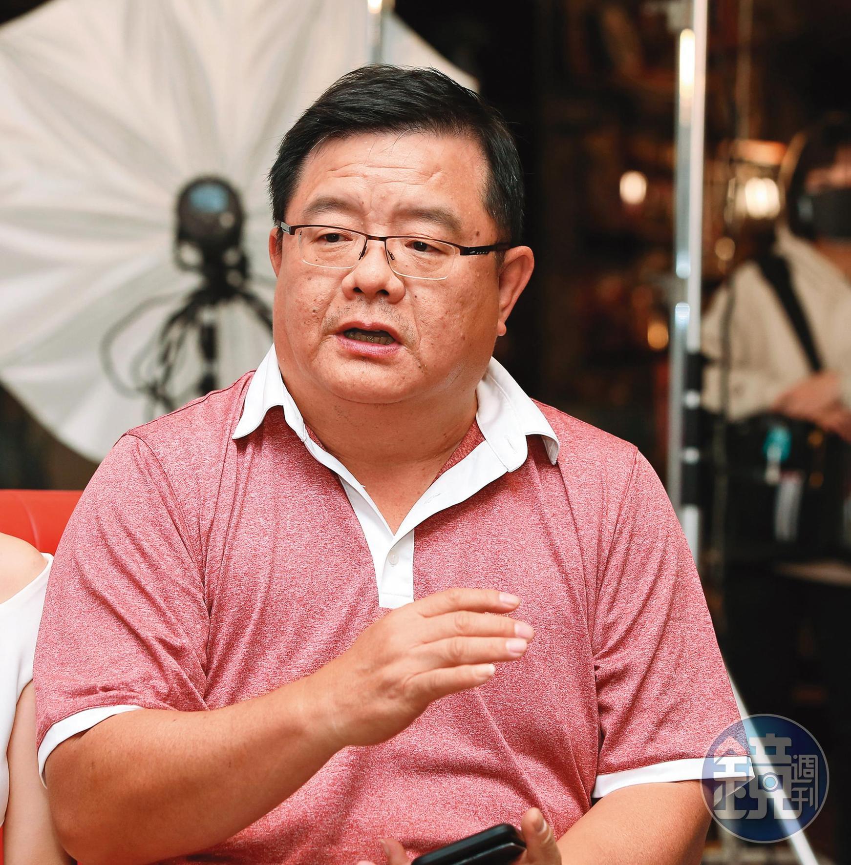 梁志民
