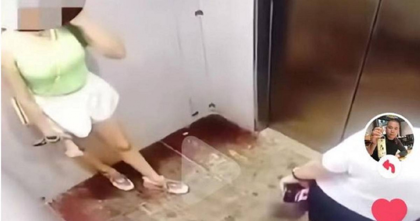 中國一對年輕夫妻搭電梯回家，見四下無人竟忍不住在電梯纏綿大戰。（翻攝自畫面）