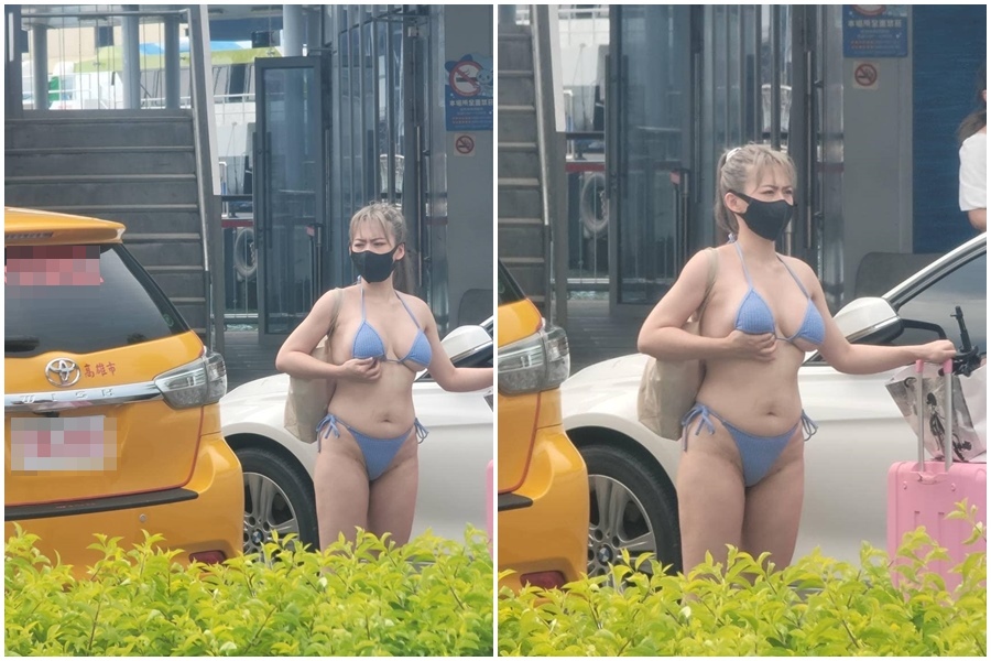 有男網友在屏東東港碼頭拍到一名馬尾爆乳妹，身上僅穿粉藍色的比基尼，大方在路邊攔車。（翻攝自爆廢公社公開版）