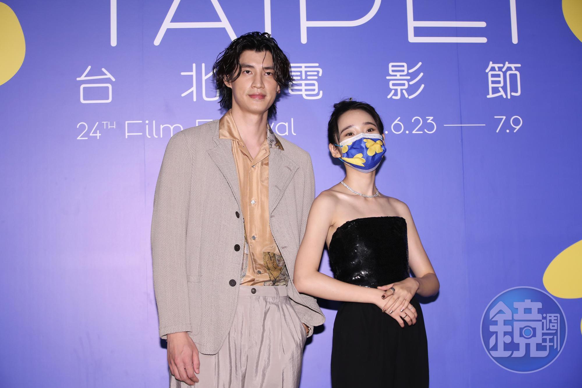 羅宏正(左)與拔了智齒堅持戴口罩的李沐(右)。