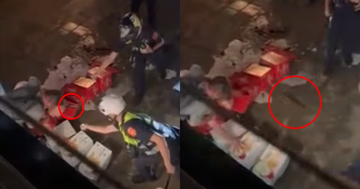 大稻埕碼頭市集一名攤販發酒瘋，竟拿起水果刀揮舞，嚇壞路人。（翻攝自記者爆料網）