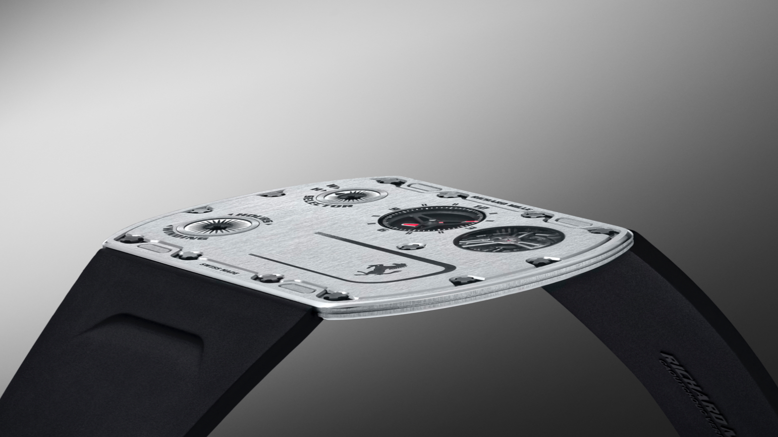 RM UP-01 Ferrari｜錶徑51mmX39mm／鈦合金材質／時、分指示、功能選擇器／RM UP-01手上鏈機芯／動力儲存約45小時／限量150只／定價USD1,888,000（匯率換算約台幣5600萬）