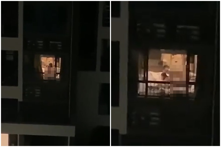 一對男女忘了拉窗簾賣力運動,全程被對面的鄰居看到。(翻攝自爆廢公社)