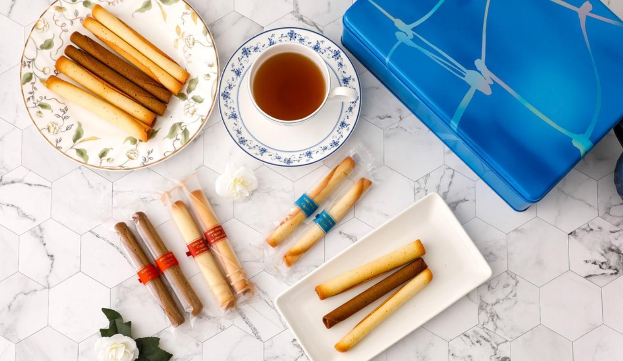 雪茄蛋捲三重奏禮盒,33入售價NT$1,750,內含原味雪茄蛋捲12入、紅茶雪茄蛋捲12入、巧克力雪茄蛋捲9入。(YOKU MOKU提供)