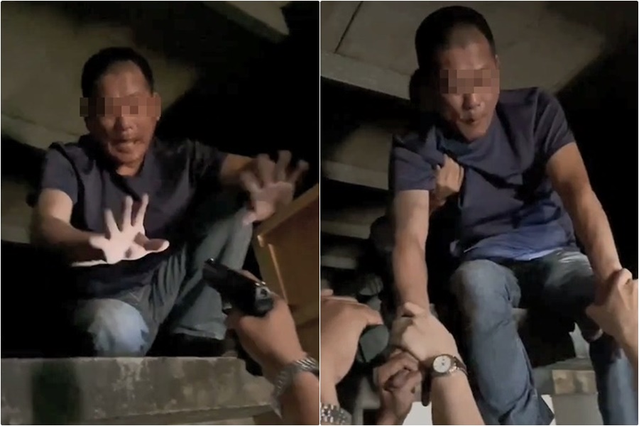 警方用槍比向李嫌，要他別輕舉妄動。（翻攝畫面）