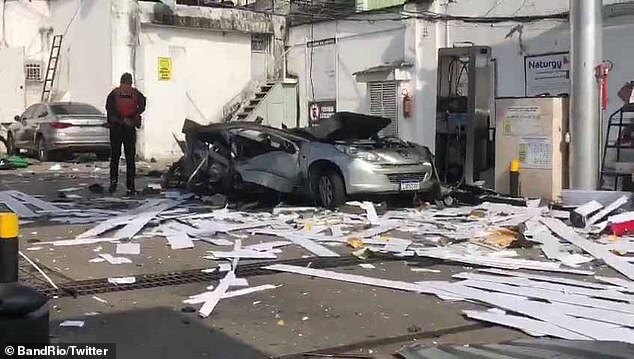 加油站建材跟馬格海斯的汽車，都被炸壞。（翻自《每日郵報》）