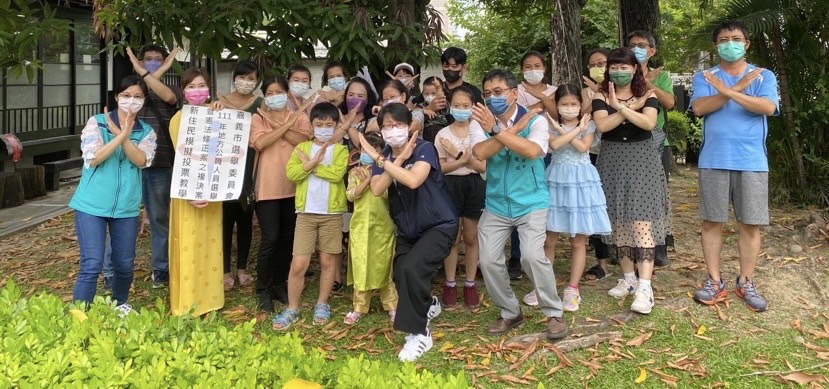 參與活動的新住民,齊心向賄選說不。(嘉義市服務站提供)