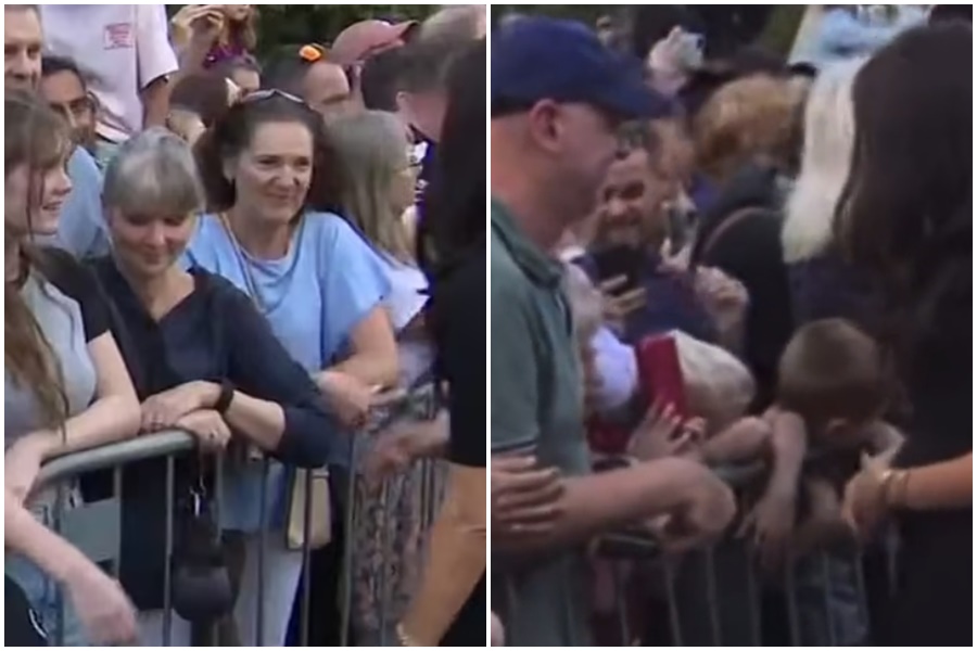 梅根10日在溫莎堡外與前來弔念已逝女王的群眾握手致意，卻有部分民眾不領情，不願與她握手。（翻攝自推特）