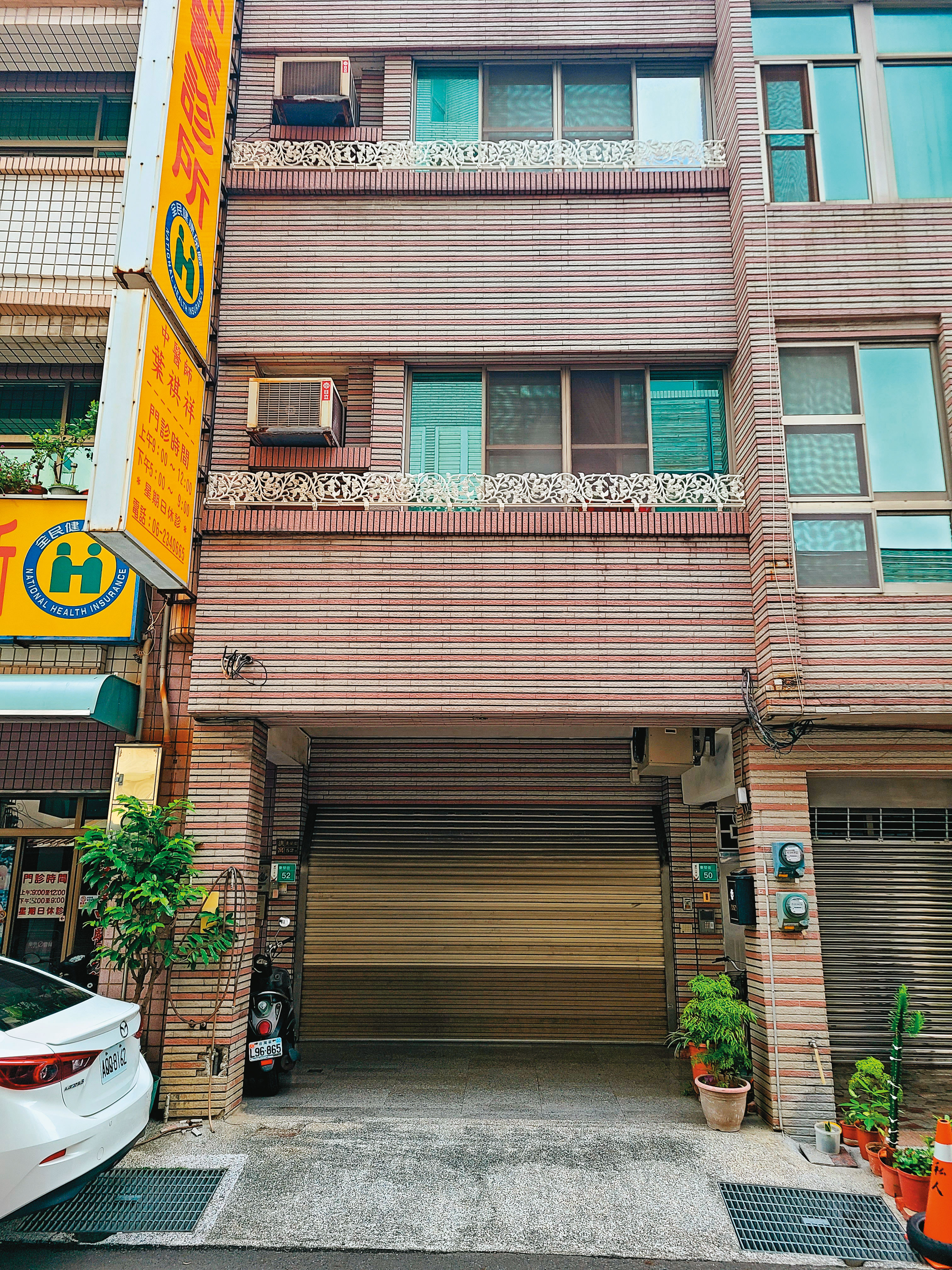 洪水樹家族在台南市民宅設立多家投資公司。
