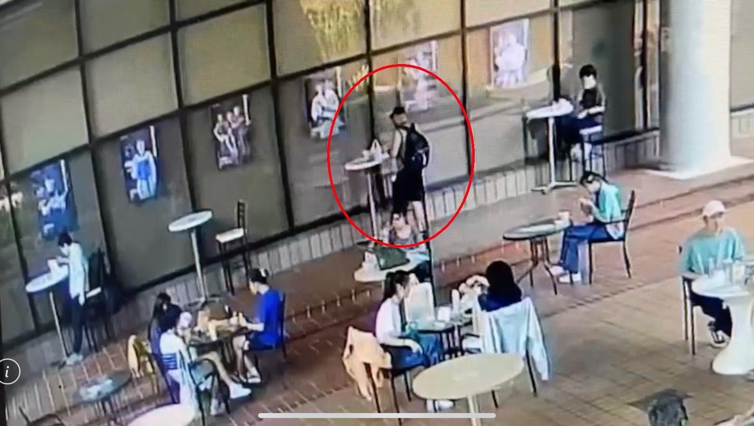 李男在國圖戶外用餐區發現便當，擅自將便當吃光光。（翻攝畫面）