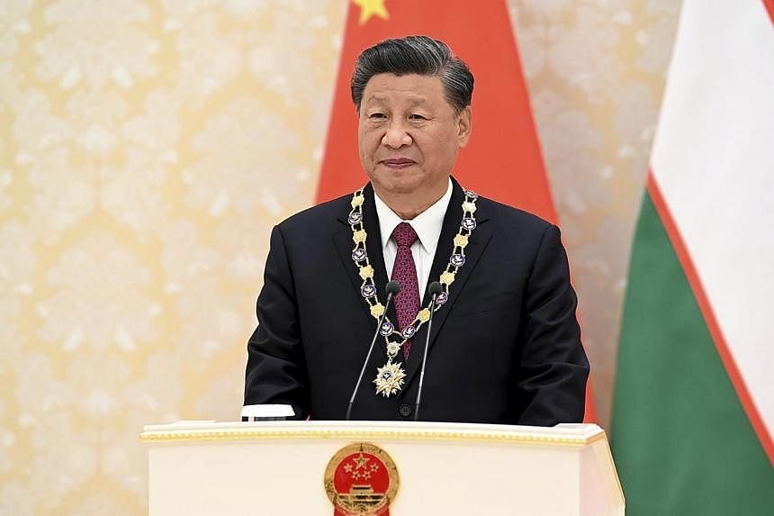 習近平習近平習近平！官媒刊登次數超越毛澤東，邁向「習帝」之路。（翻自straitstimes.com）