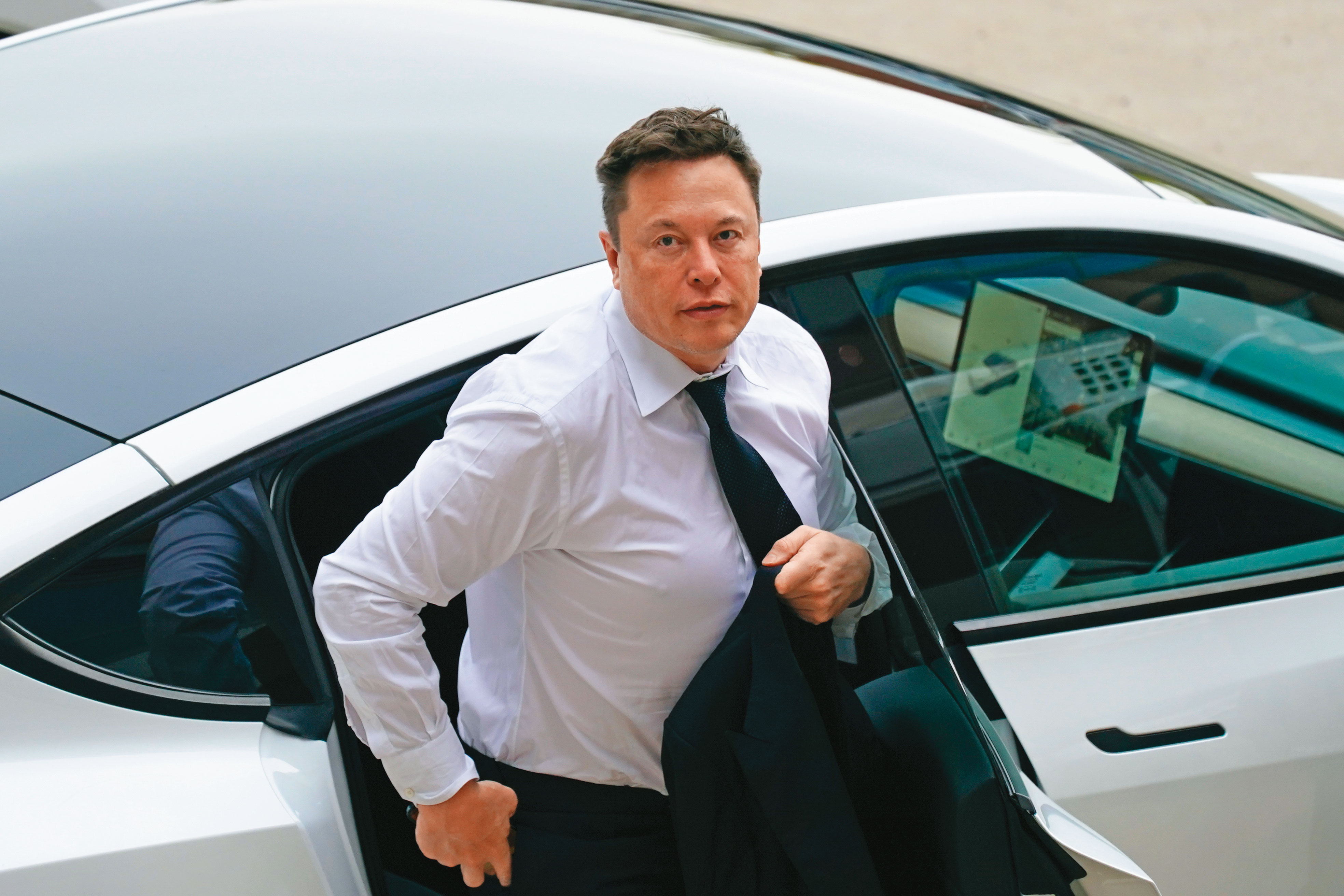 特斯拉執行長馬斯克曾預言,假以時日,機器人的市場將比電動車更具價值。(達志影像)