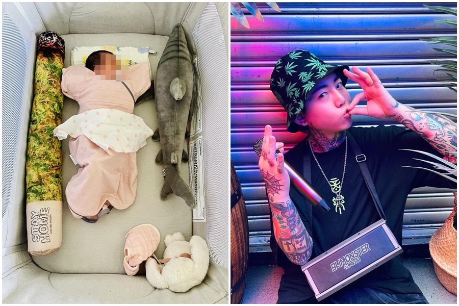謝和弦在女兒嬰兒床內除了擺進一隻鯊魚玩偶，還有一個大麻菸造型的抱枕。（翻攝自謝和弦臉書）
