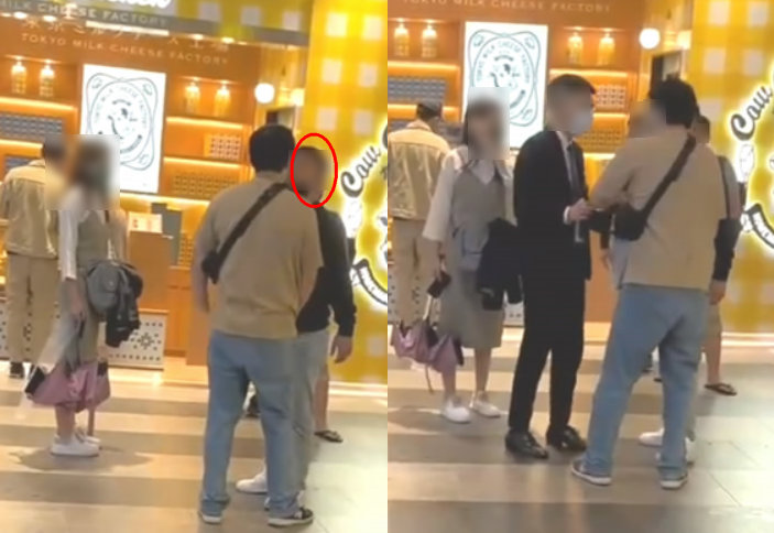 信義商圈驚傳隨機噴辣椒水事件，被害人追上前與可疑涉案黑衣男（紅圈處）對質。（翻攝Line群組「社會事新聞影音」）