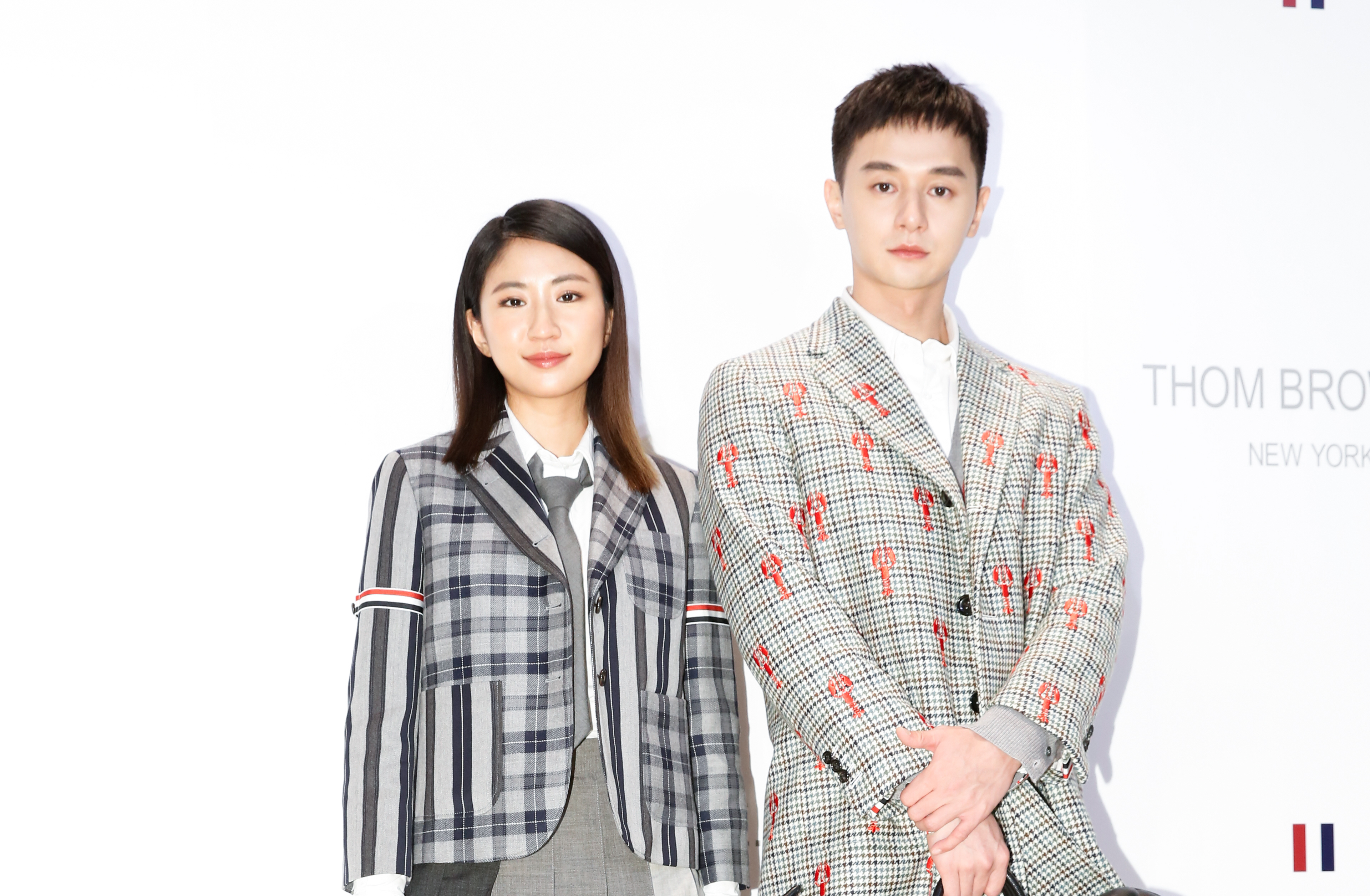 （左起）9m88與張軒睿連袂出席THOM BROWNE台北微風南山店開幕活動。
