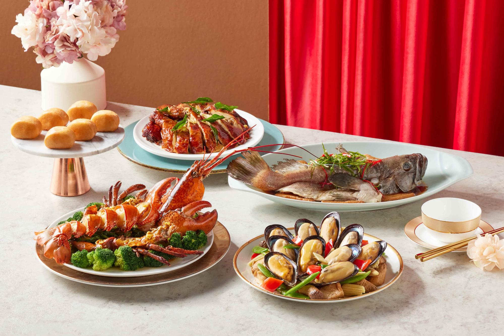 莆田年菜充滿十足海味,其中波士頓龍蝦喜氣又吸睛。(王品集團提供)