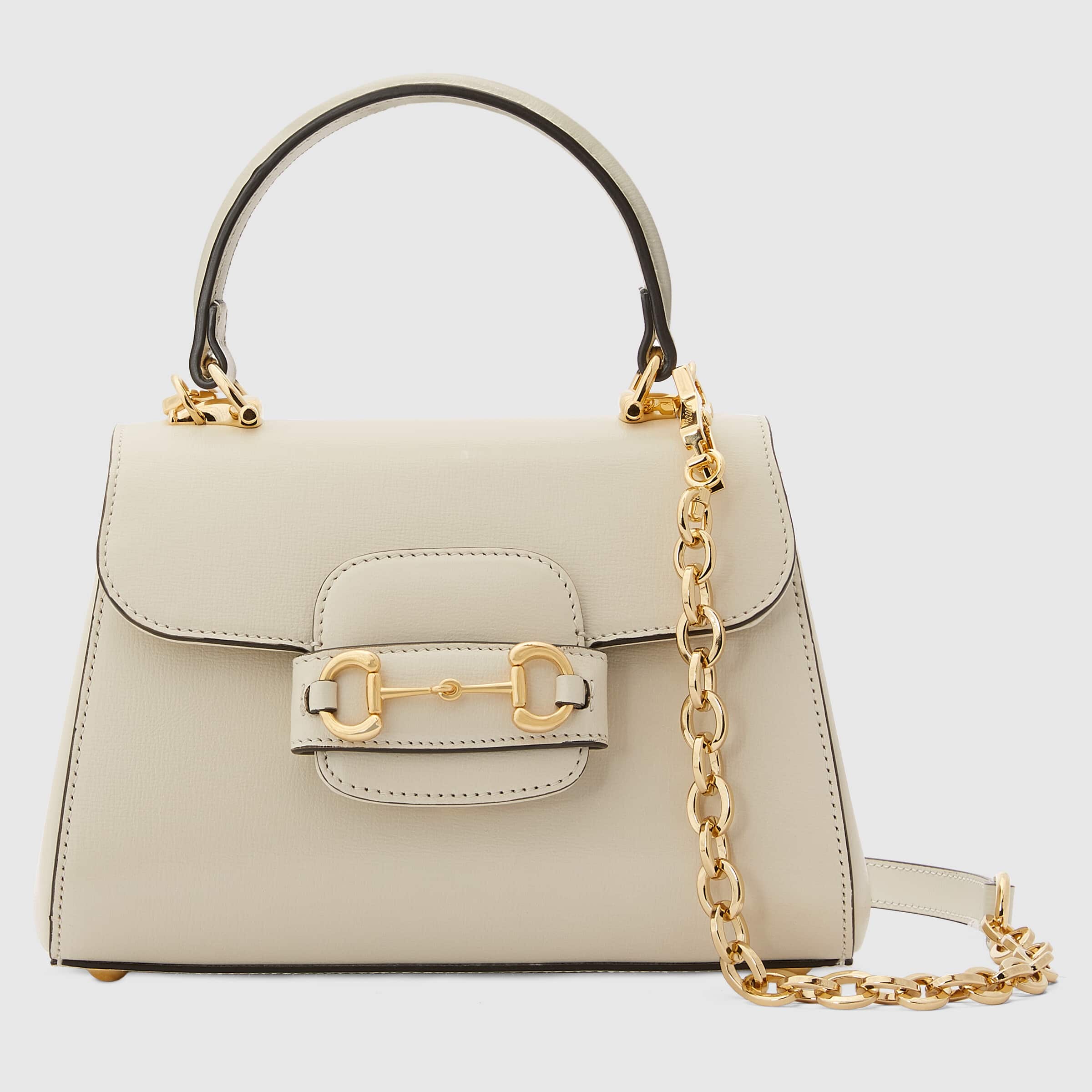 GUCCI Horsebit 1955中號白色皮革手提肩背包。NT$100,800(古馳提供)