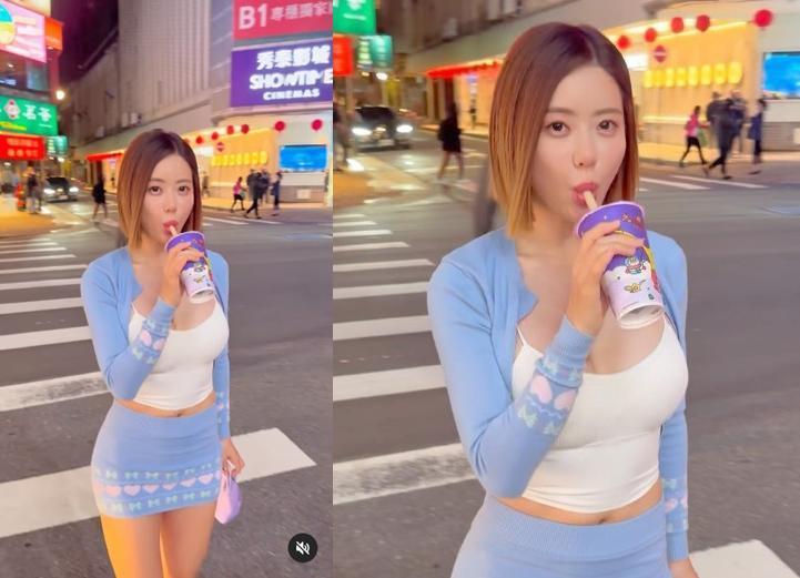 DJ SODA不畏寒流,穿低胸小可愛、超短裙現身台北街頭,滿足大口吸珍珠奶茶嚐鮮。(翻攝IG @deejaysoda)