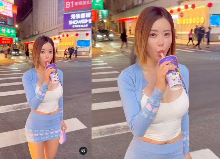 DJ SODA不畏寒流，穿低胸小可愛、超短裙現身台北街頭，滿足大口吸珍珠奶茶嚐鮮。（翻攝IG @deejaysoda）