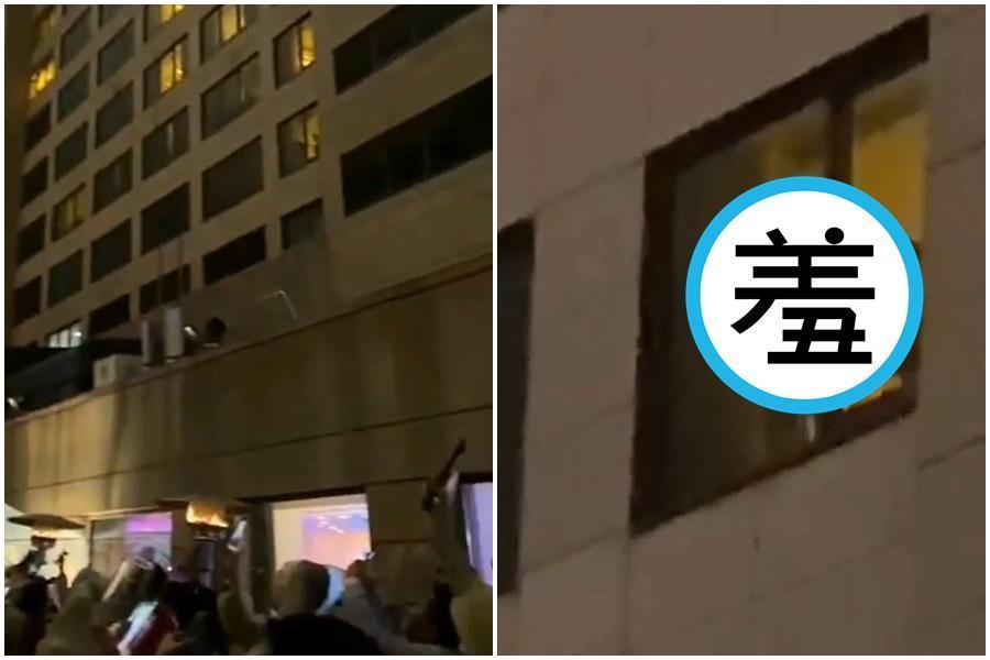 民眾錄下101跨年煙火當下，意外發現一旁飯店房間床台，正在上演活春宮。（翻攝自爆料公社）