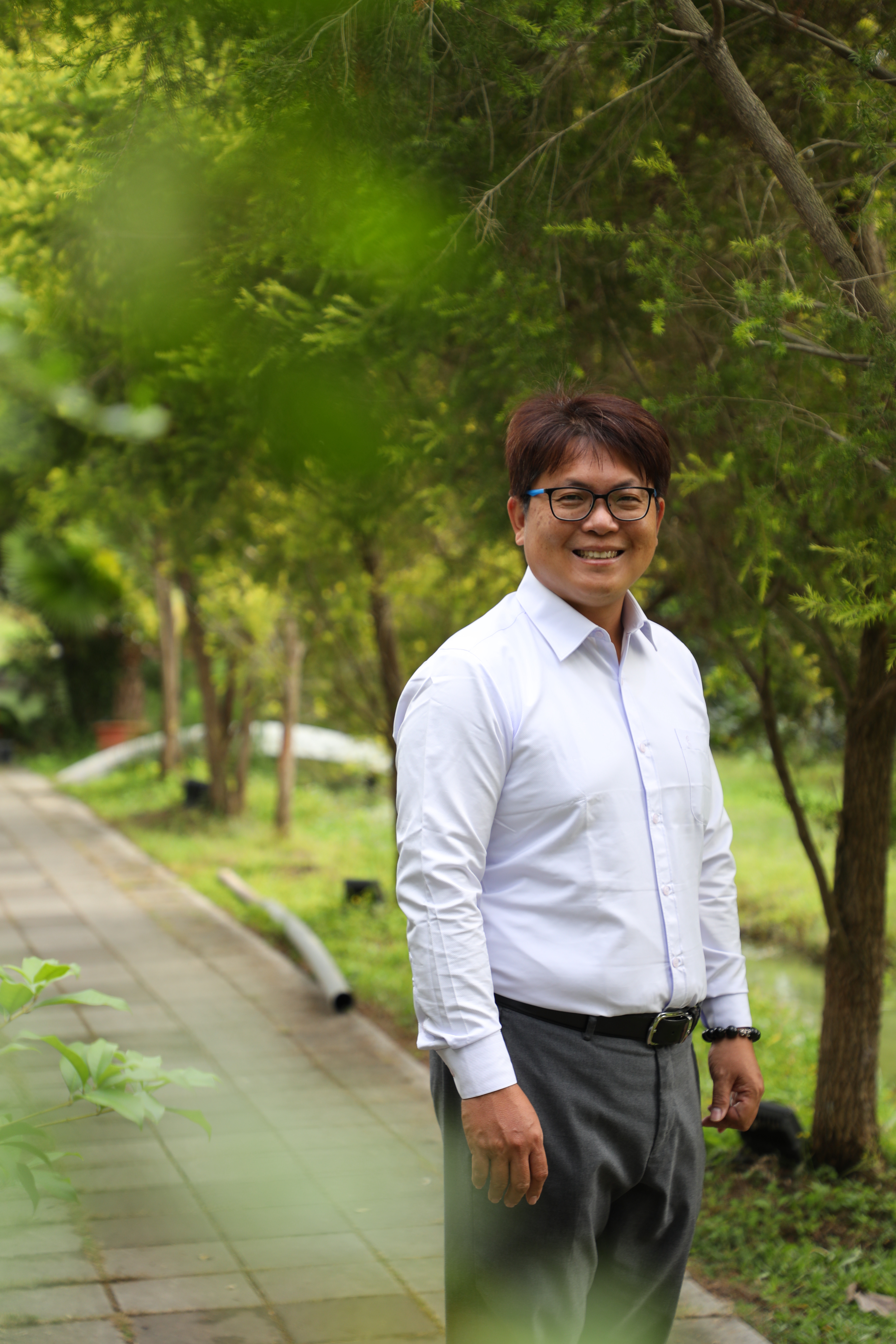 陳宏志將父親陳文懃經營多年的蘭花園發揚光大。