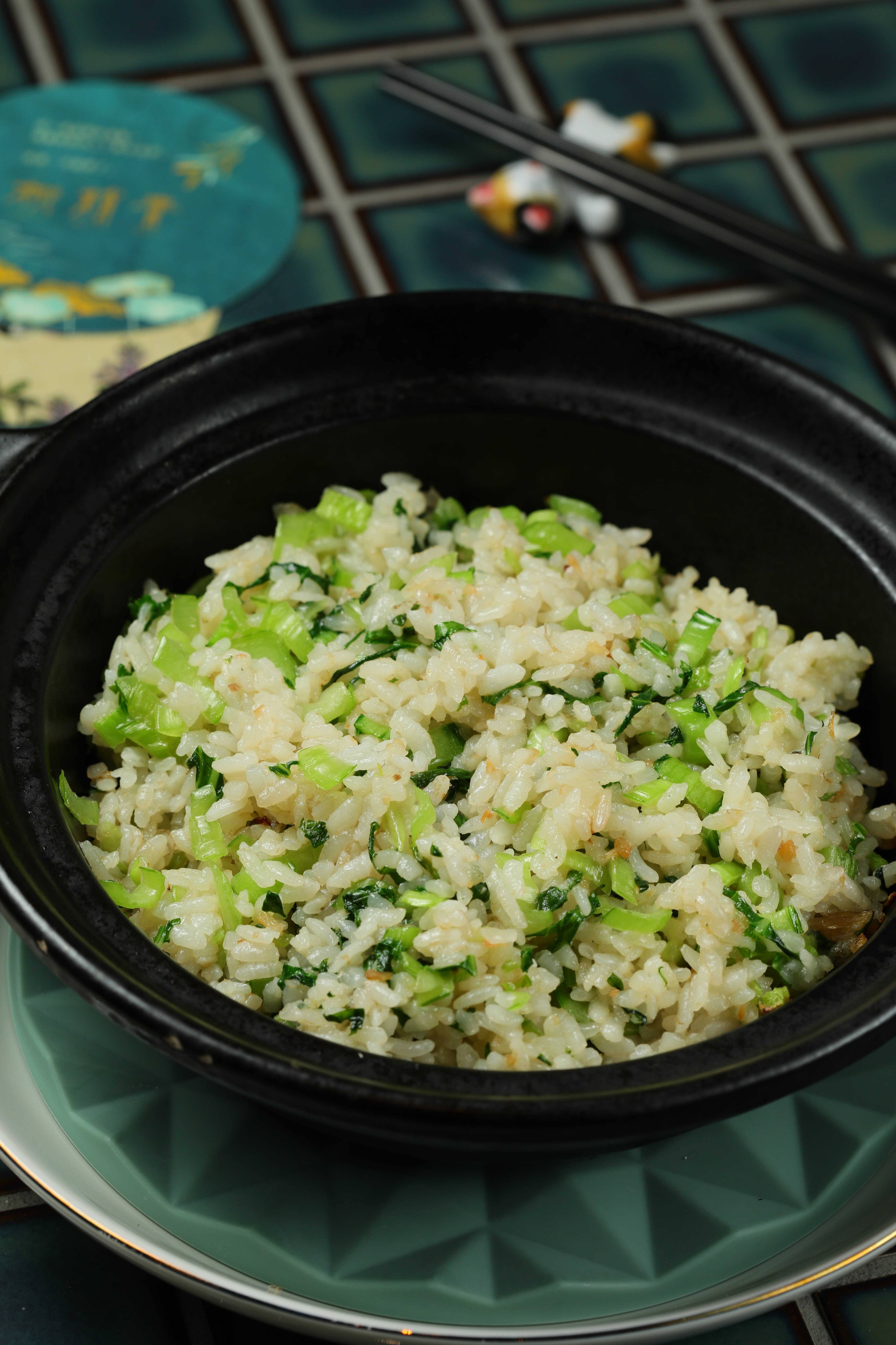 「砂鍋菜飯」的米粒吸飽醃篤鮮白濃湯精華。（220元／份）