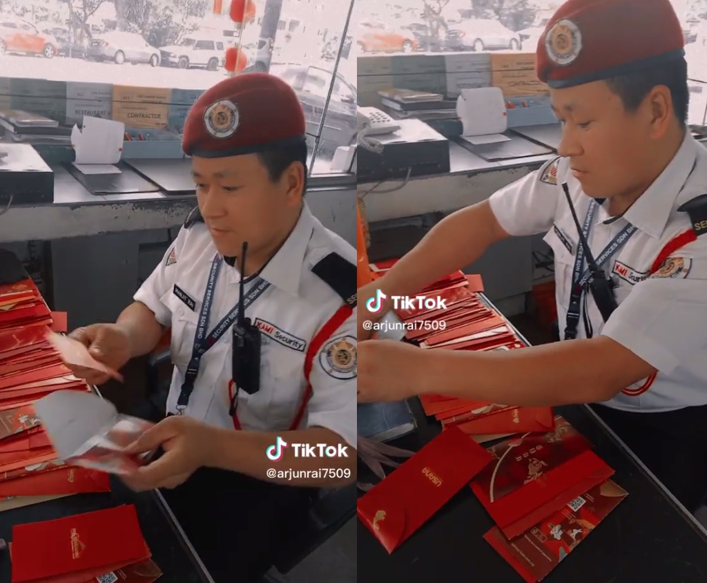馬來西亞一棟大樓警衛數紅包數到手軟。（翻攝自TikTok@arjunrai7509）