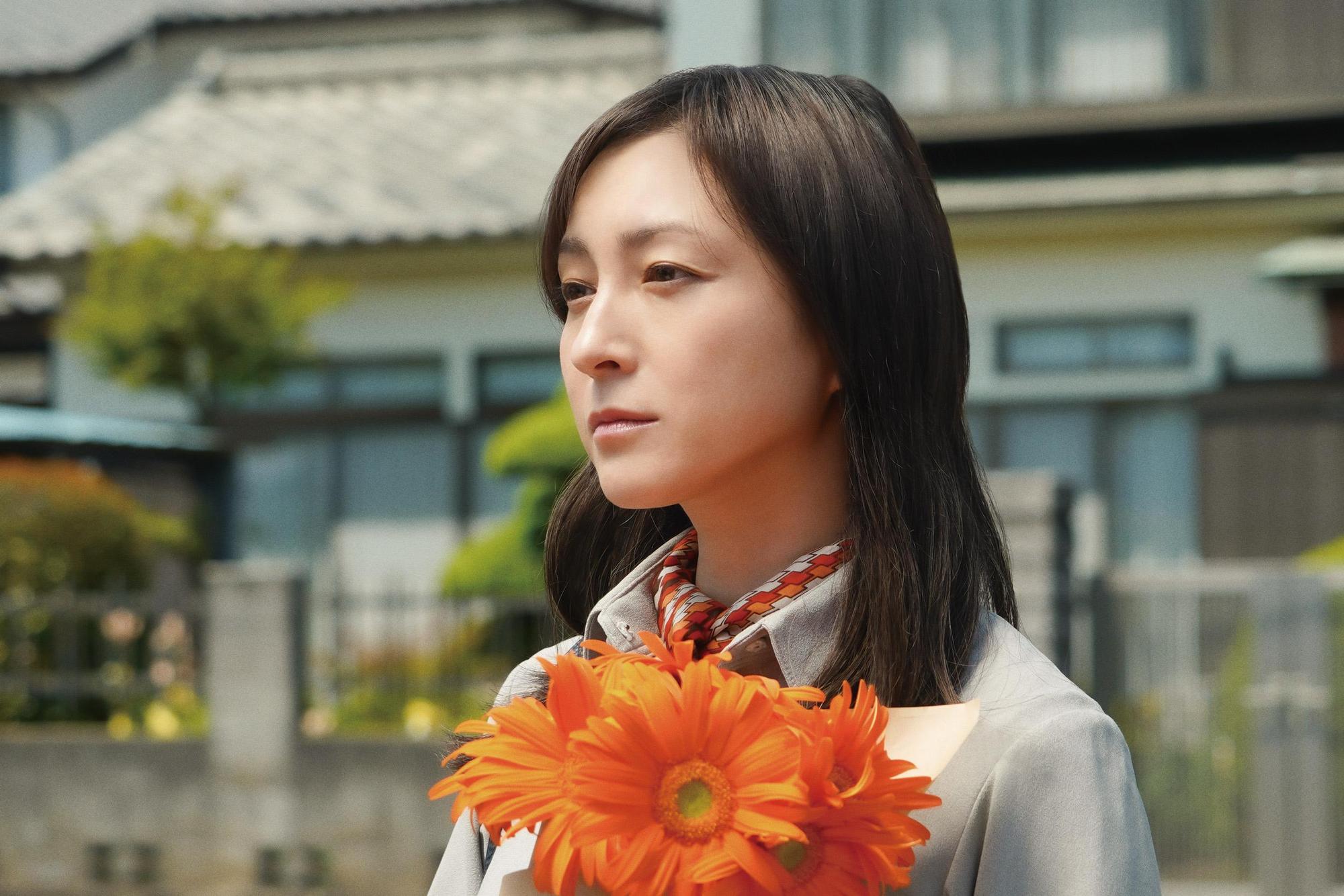 廣末涼子飾演豐川悅司的妻子，明知老公與多名女子搞曖昧，仍選擇不聞不問。（原創娛樂提供）