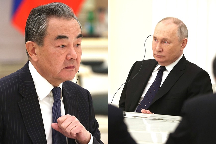 王毅（左）前往莫斯科會見普丁（右），傳是習近平訪俄前奏。（翻攝自克里姆林宮）