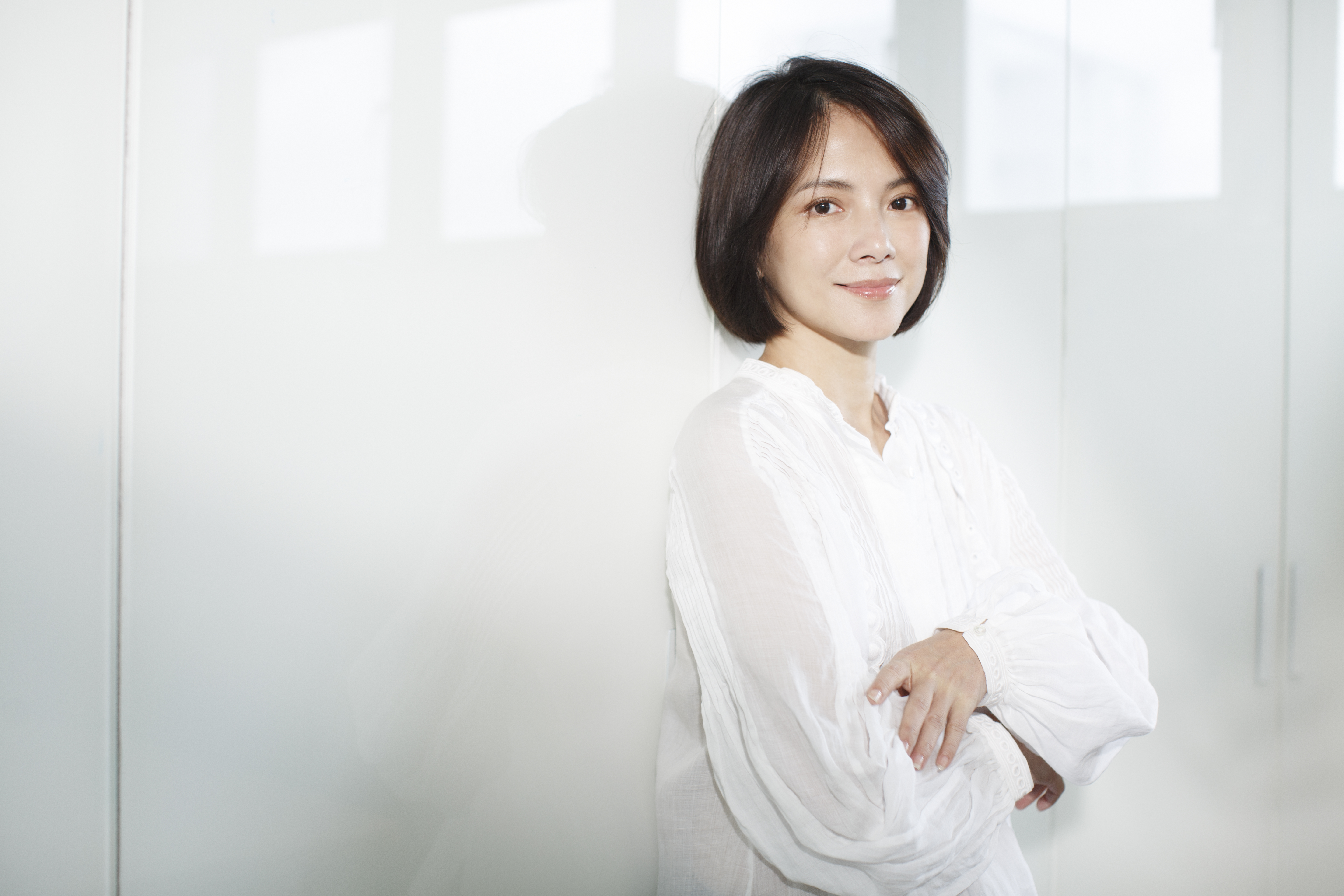 工作閒暇李心潔全力投入「小黃花慈善基金」，對馬來西亞的貧窮弱勢學童提供免費午餐及教學等幫助。（甲上）
