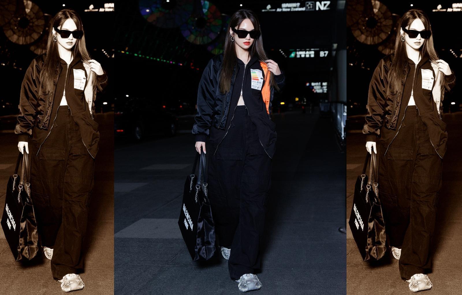 楊丞琳身穿BALENCIAGA 2023夏季最新黑色帽衫、黑色飛行外套搭配黑色工作褲，手上的Duty Free Large Tote Bag黑色托特包NT$78,150、3XL Sneaker仿舊運動球鞋 NT$34,650。（BALENCIAGA提供）