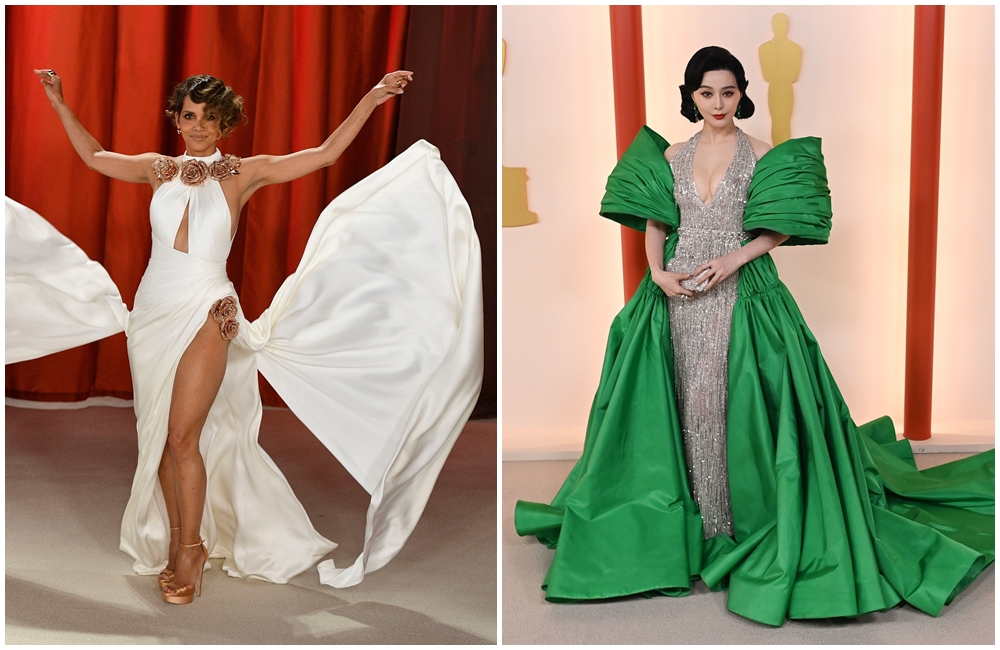 奧斯卡影后荷莉貝瑞（左）上身是大挖洞的設計，但她很聰明知道拍照就是要掀裙擺才夠美。好久不見的范冰冰（右）硬是在粉鑽晚禮服外頭，加上了一件綠色的皺褶大衣，又回到紅毯來蹭鏡頭了。（東方IC）
