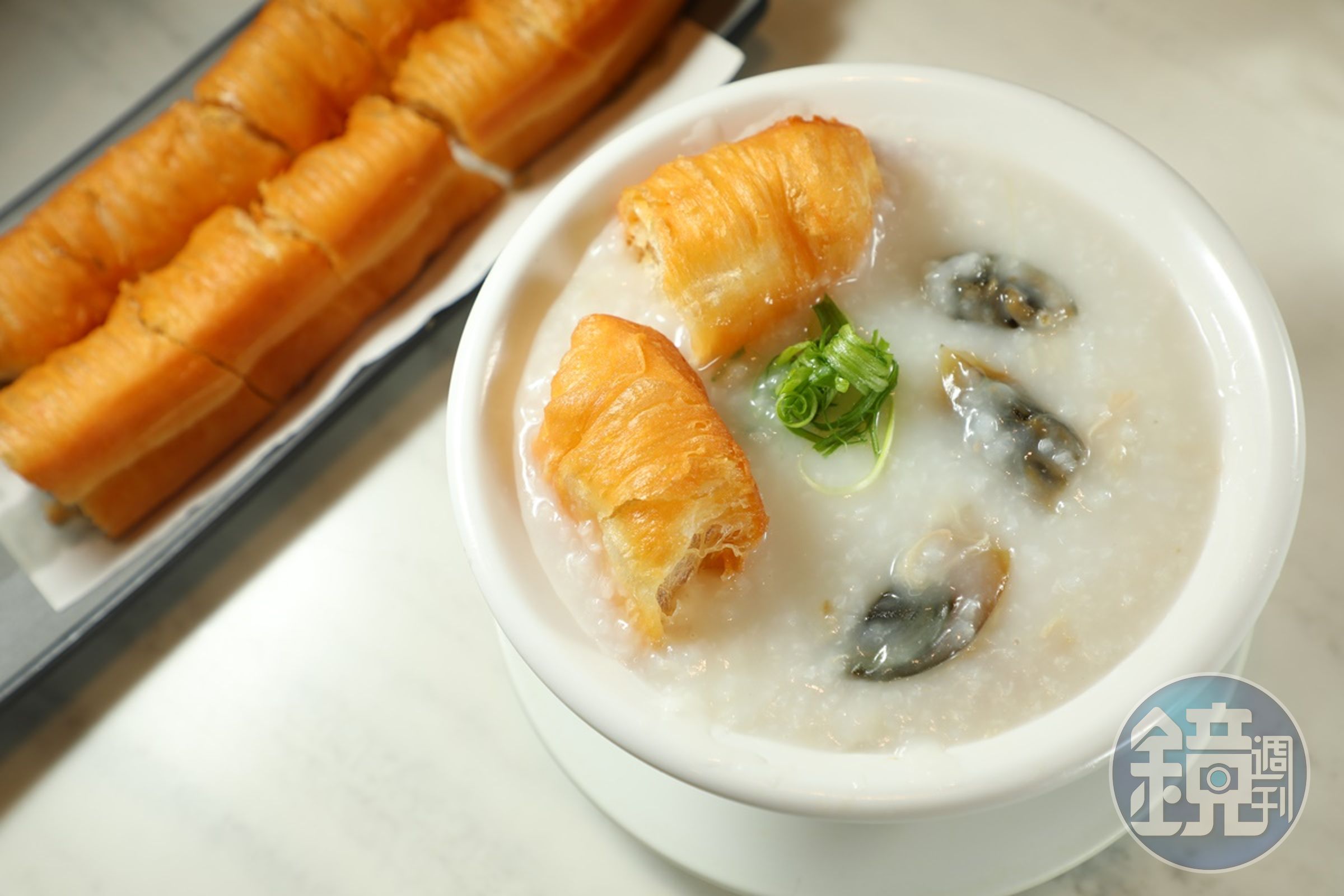 靠得住的「皮蛋瘦肉粥」有讓人回味的醇厚感。(港幣46元/碗)